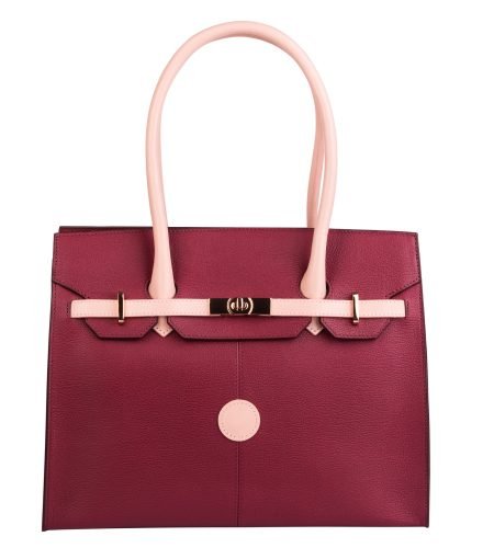 Red and pink natural leather female purse isolated on white